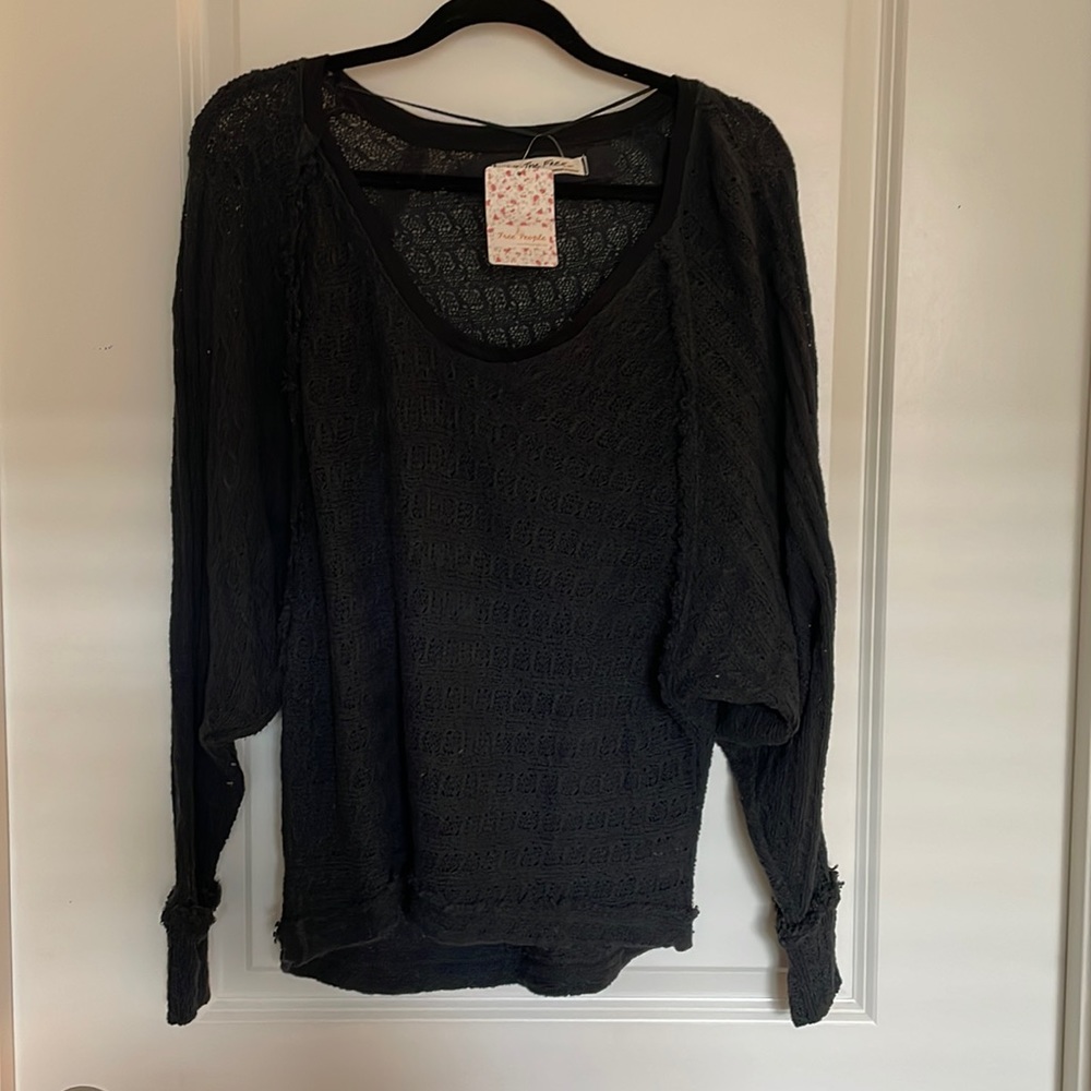Free people, washed black thin sweater, never worn ! With tags still attached